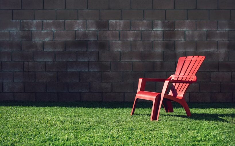 red chair in the backyard